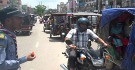 নাটোর শহরে যানজট নিরসনে কাজ করছেন স্কাউট ও  শিক্ষার্থীরা